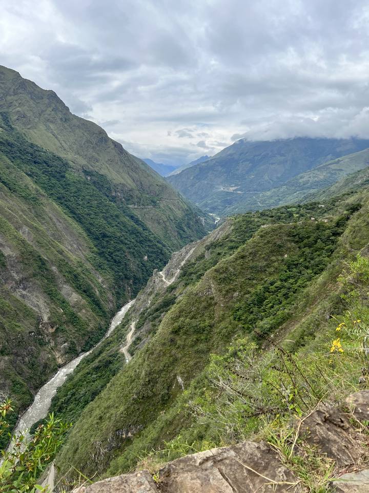 Aerial view of a mountain valley with a road.