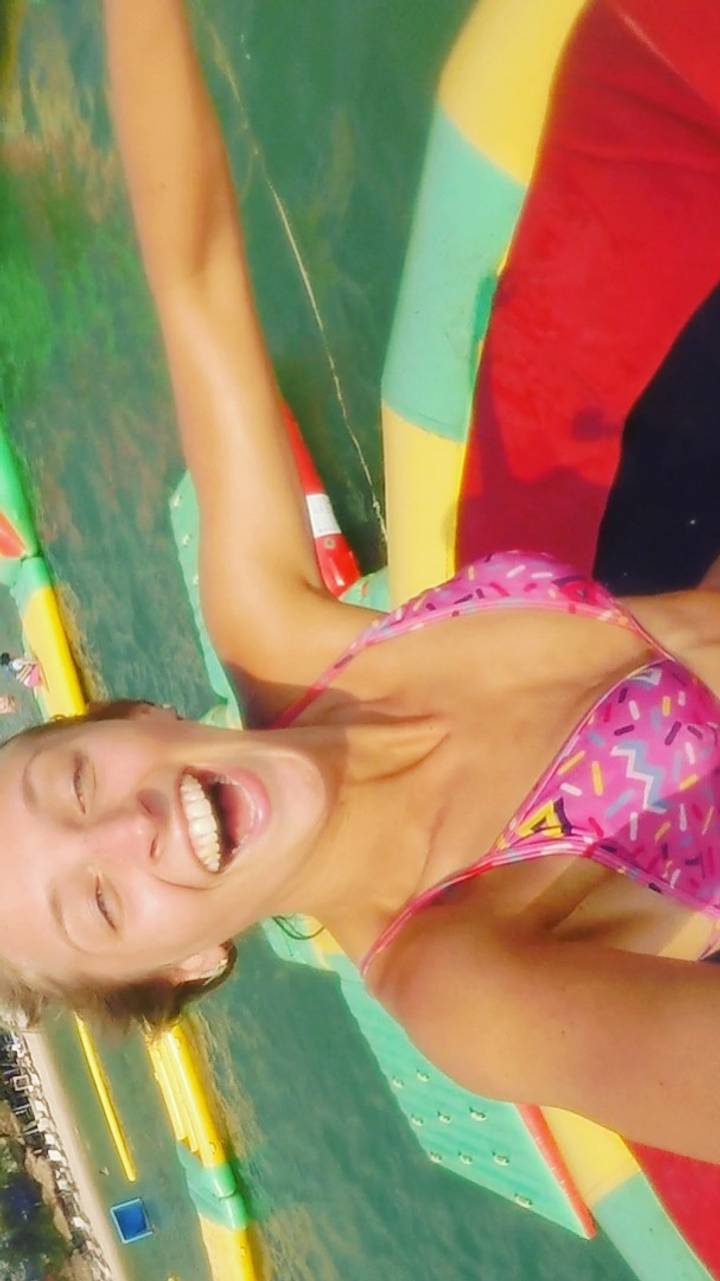 Person enjoying a water park ride.