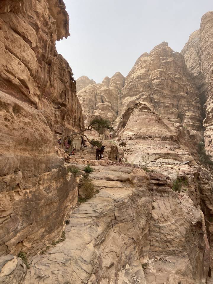 Petra rock formations with travelers.