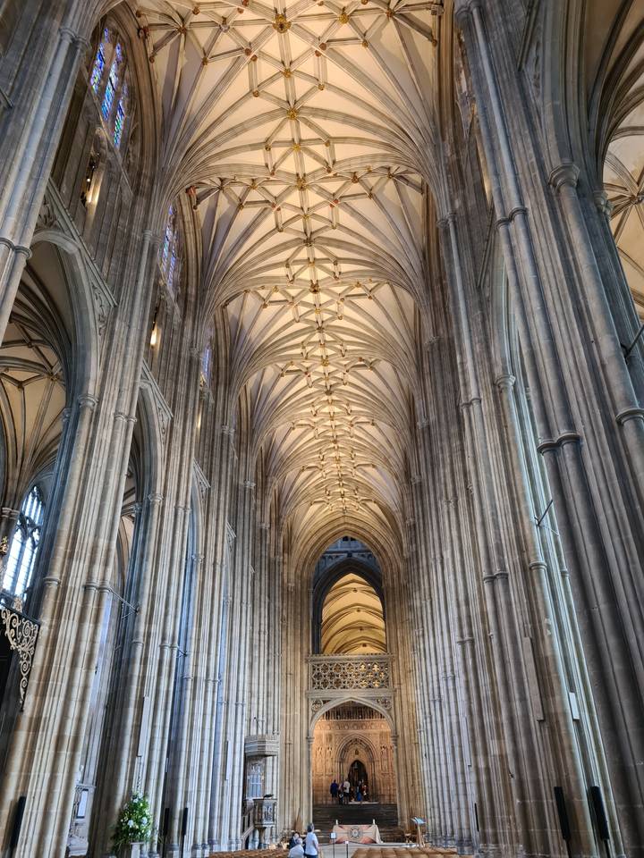 A gothic cathedral interior with intricate ceilings.