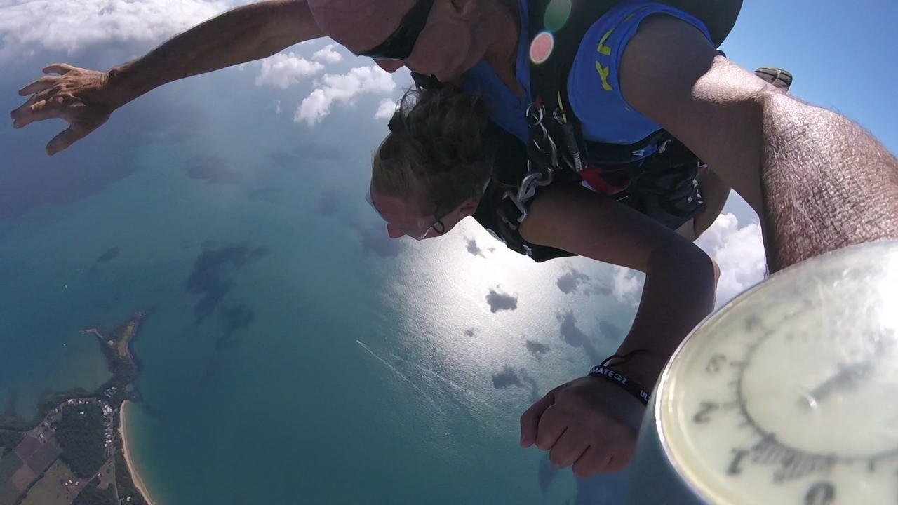 Skydiving view above the coastline.