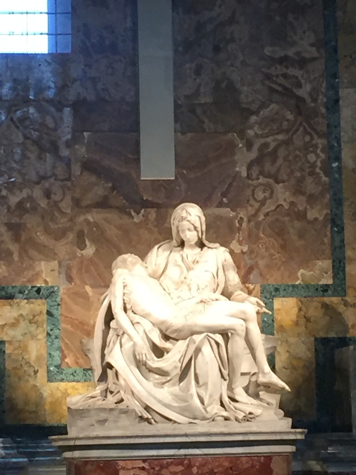 The Pietà sculpture by Michelangelo inside a church.