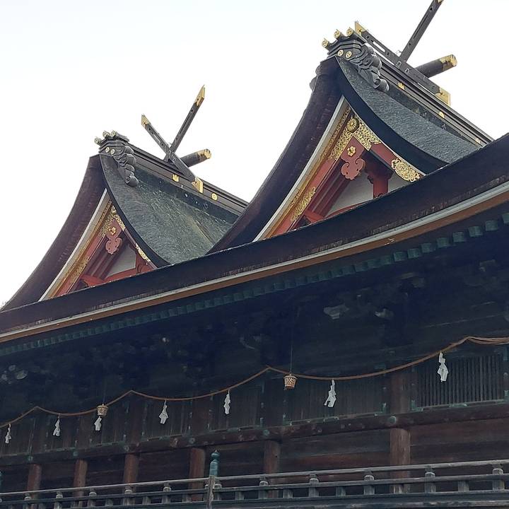 Decorative elements on a temple roof with intricate carvings.