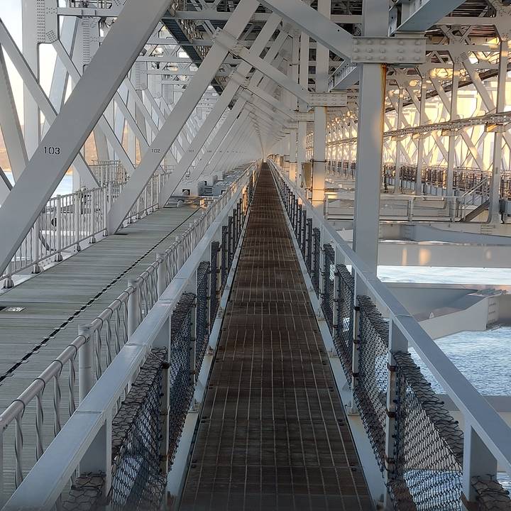 Industrial structure with metal beams and walkways.