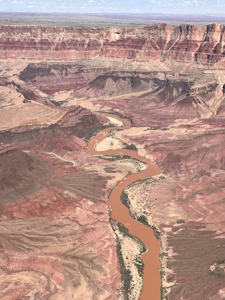 Red rock canyon with a winding river.