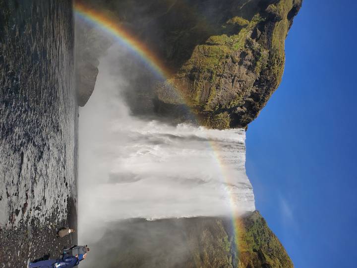 Waterfall with a rainbow in the mist.