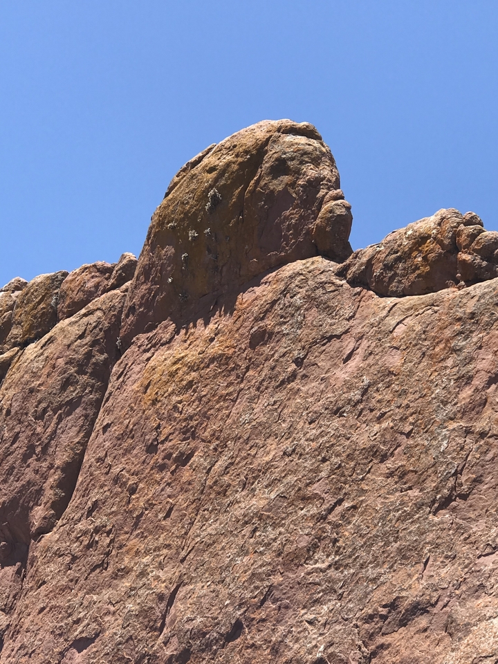 Rocky cliff with distinct textures and formations.