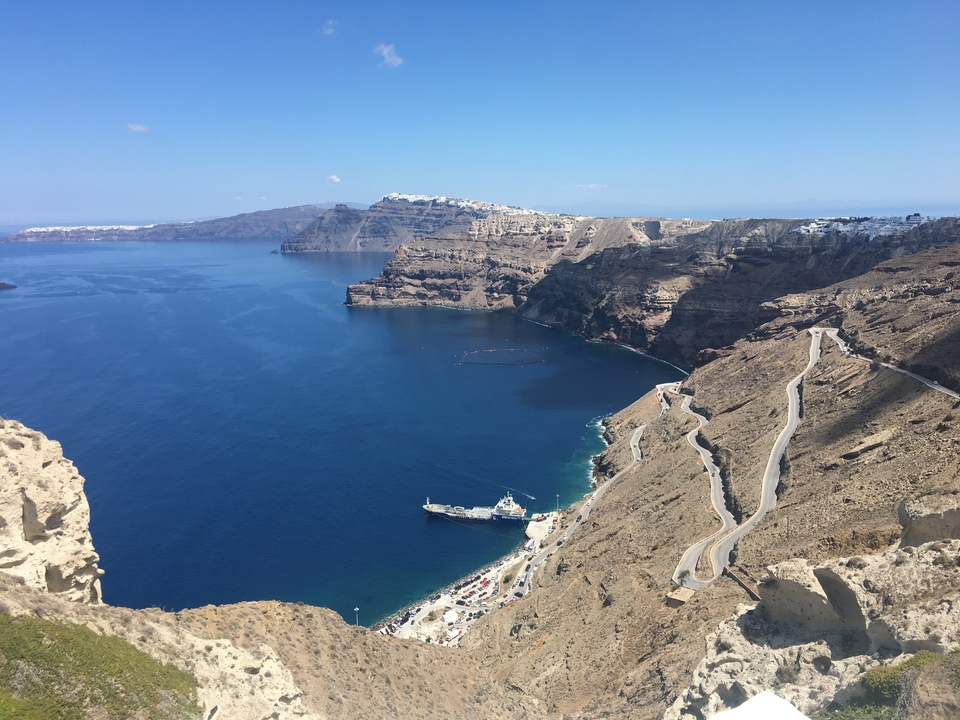 Stunning view of a coastal area with clear blue water and cliffs.