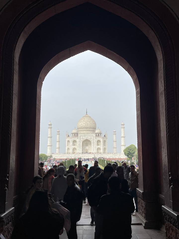 View of the Taj Mahal from a gateway arch.
