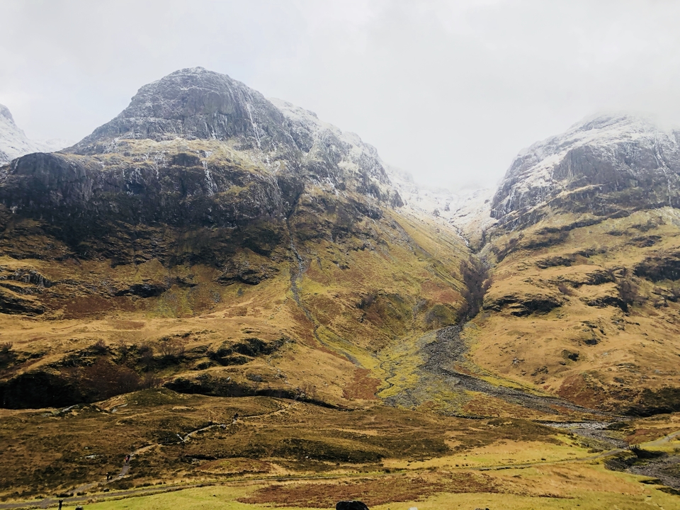 Snow-covered rugged mountains.