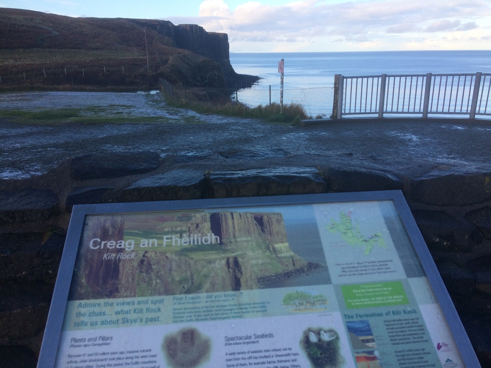 Information board overlooking a scenic view.