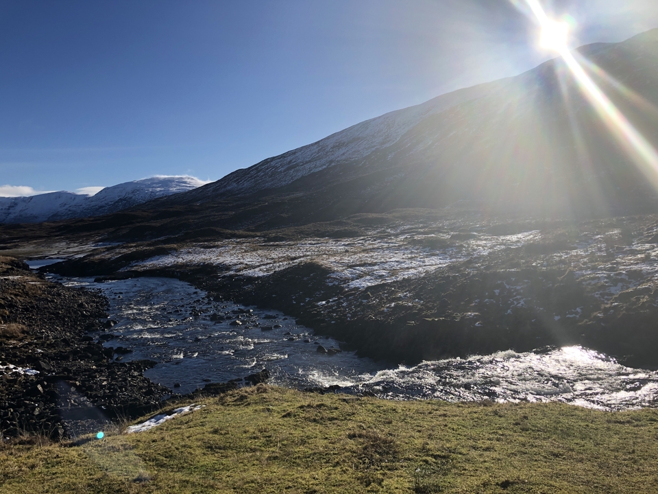 River flowing through a mountainous region.