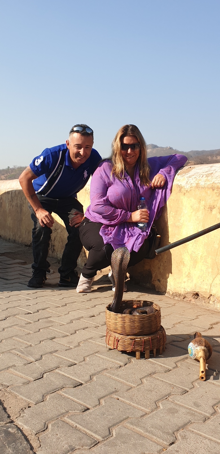 Two people posing on a sunny day