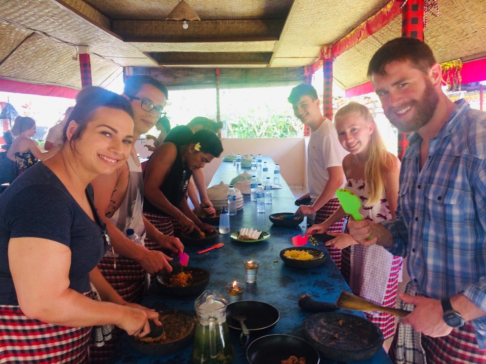 Group of people participating in a cooking class