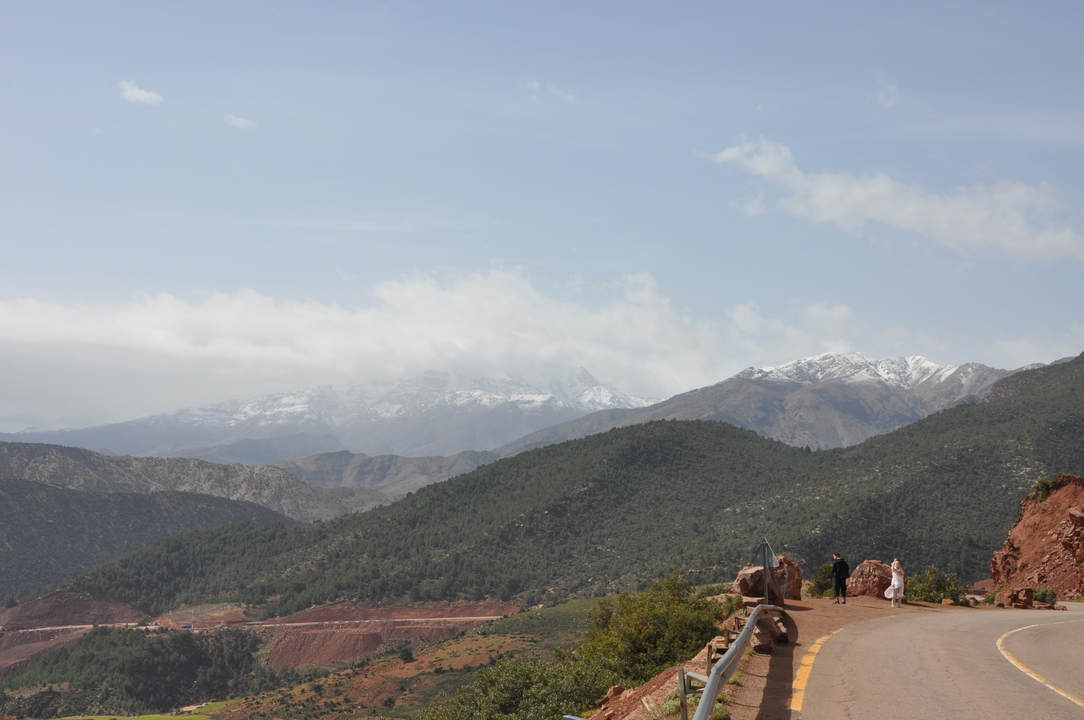 Scenic mountain road with snow-capped peaks