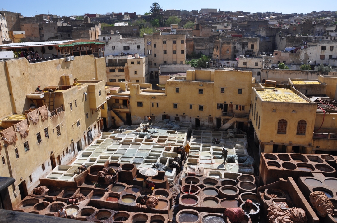 Traditional tannery with colorful dye vats