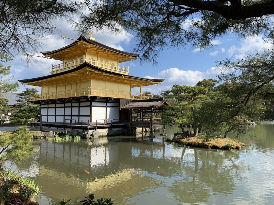 Golden Pavilion by a peaceful pond