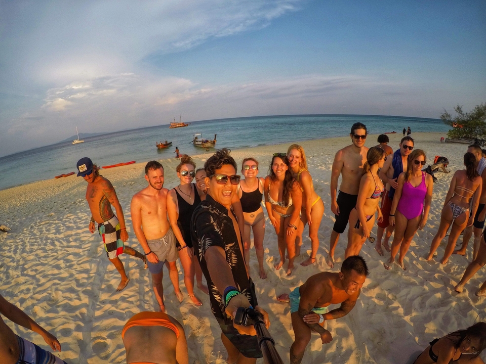Friends on the beach enjoying a sunny day.