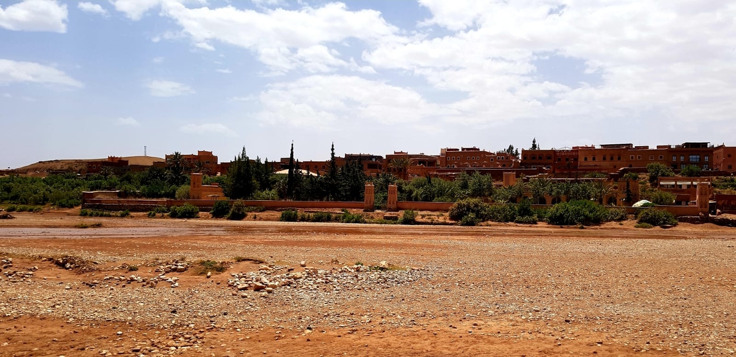 A village with traditional clay buildings.