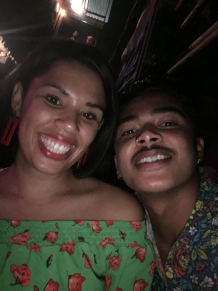 Close-up of two smiling people.