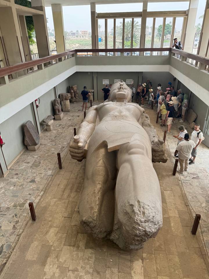 A colossal statue inside a museum.