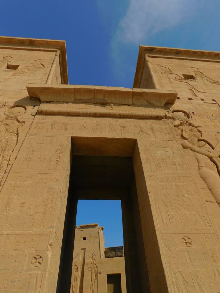 Ancient Egyptian temple with hieroglyphic carvings.