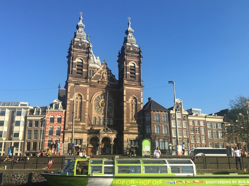 Historic church with twin towers in Amsterdam.
