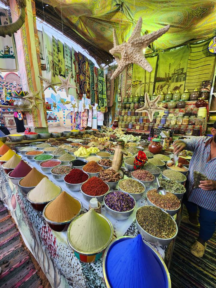 Assorted spices in a market booth.