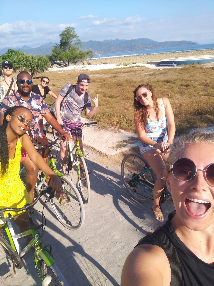 Group of people on bicycles.