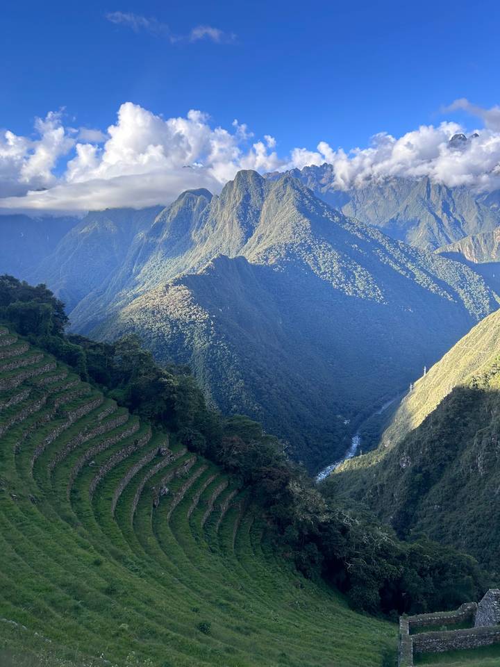 Panoramic view of terraced mountains and valleys.