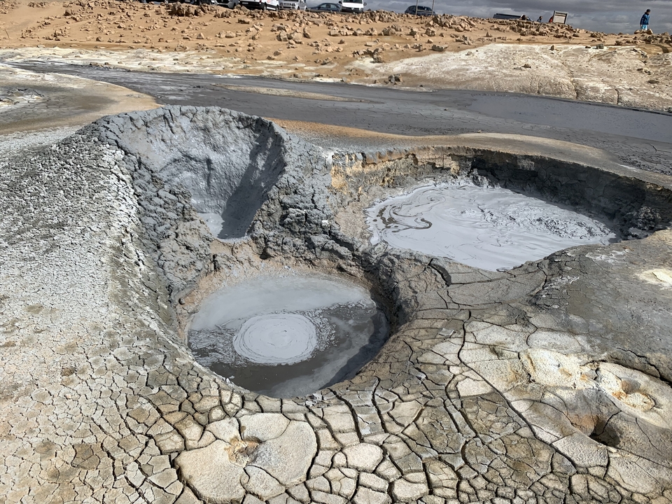 Geothermal area with clay and mud formations.