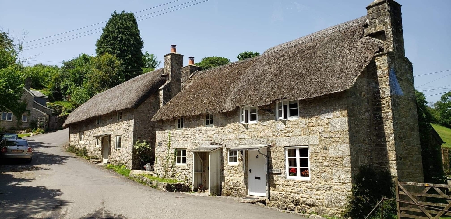 Traditional thatched stone cottages