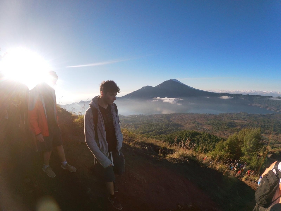 Person at a scenic mountainous viewpoint.