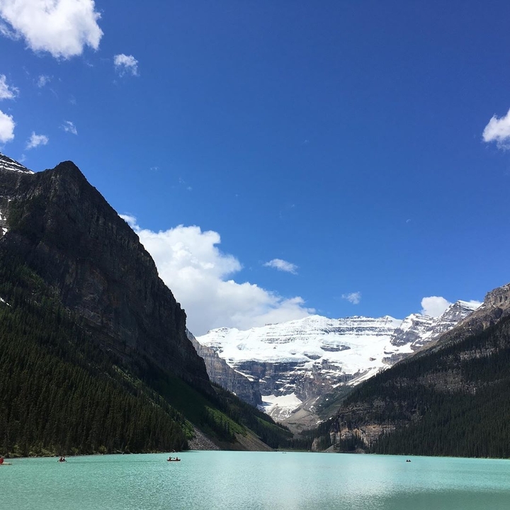 Mountain landscape with snow-capped peaks.