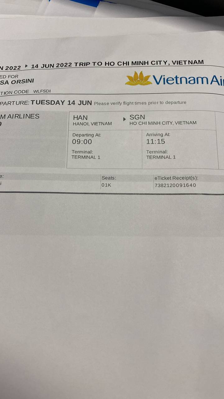 A flight boarding pass with airline and flight details.