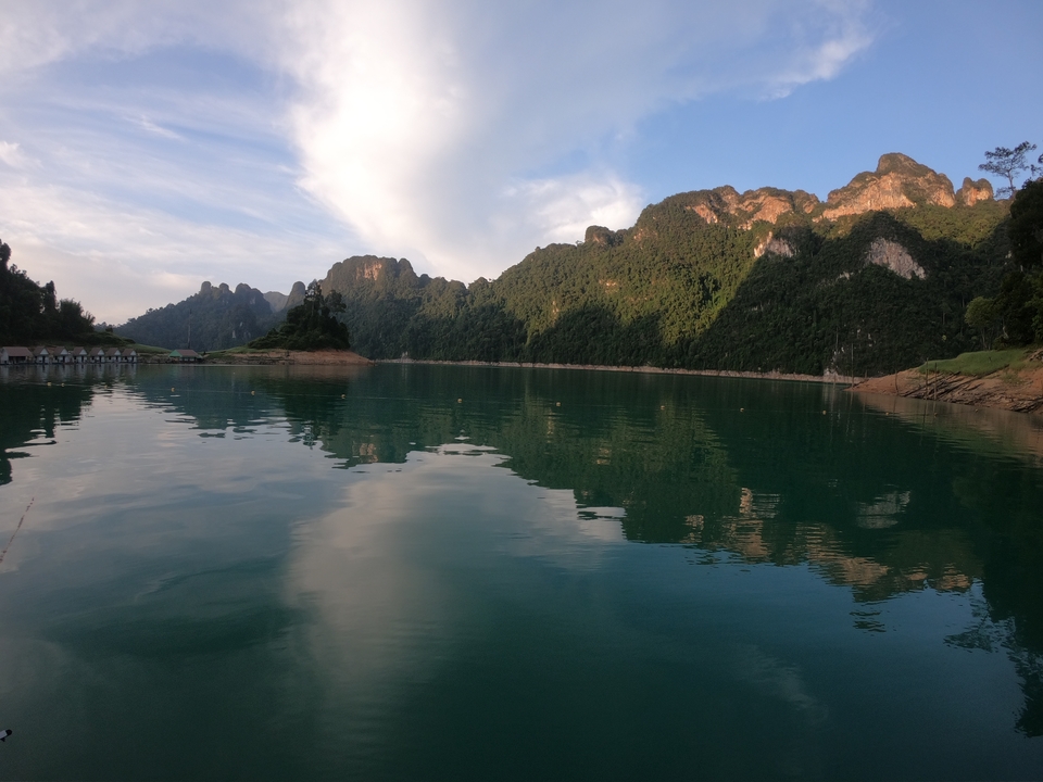 Waterbody with lush green hills