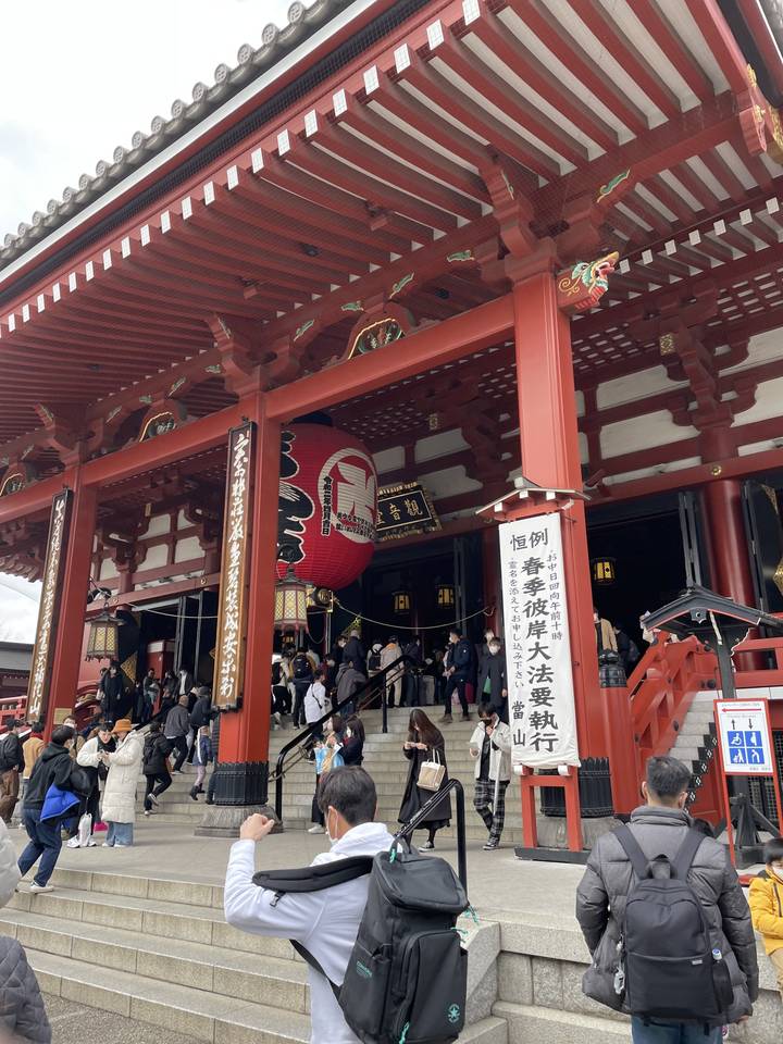 Entrance to a temple with a large red lantern.