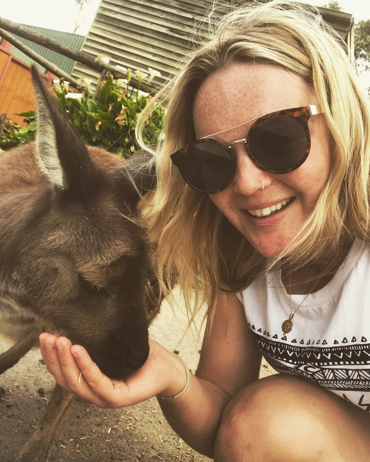 Close-up selfie with a kangaroo.