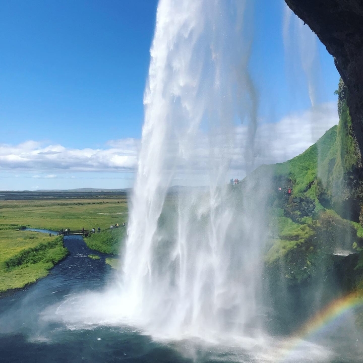 Spectacular waterfall cascading over rocky cliffs.