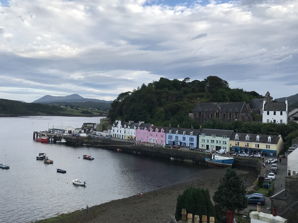 Colorful buildings along the waterfront in a Scottish town.