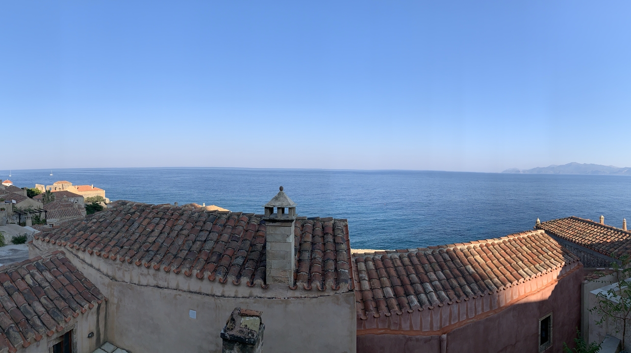 Sea view with rooftops in the foreground