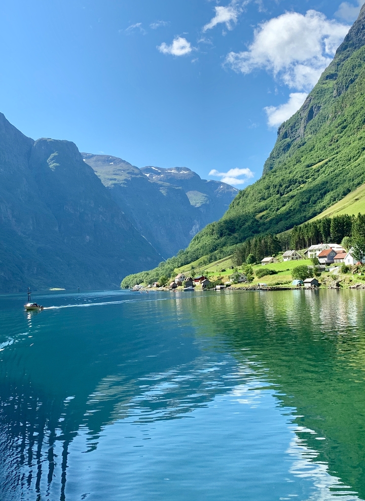 Fjord landscape with water and mountains.