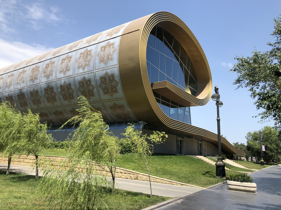 Modern architecture with a curled roof.