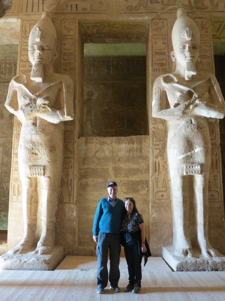 Ancient Egyptian statues at a temple.