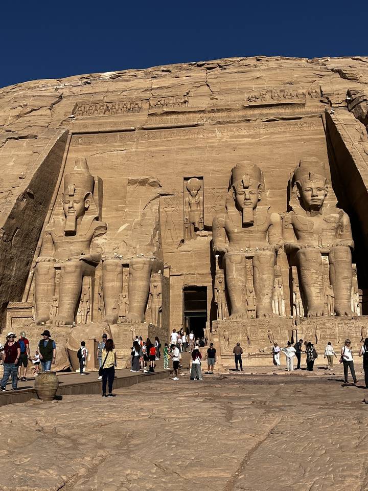 Tourists in front of the Abu Simbel temple statues.