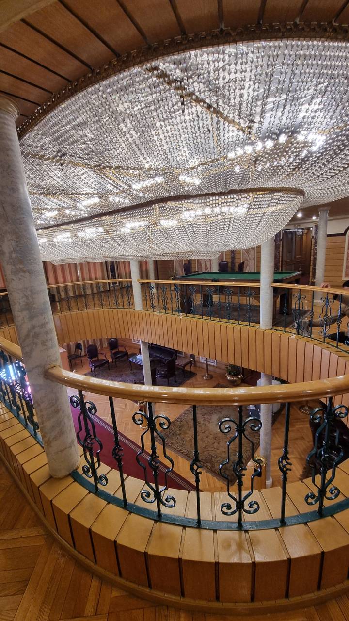 Decoration of a chandelier and railings indoors.