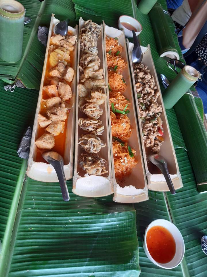 Assorted Thai dishes served in bamboo.