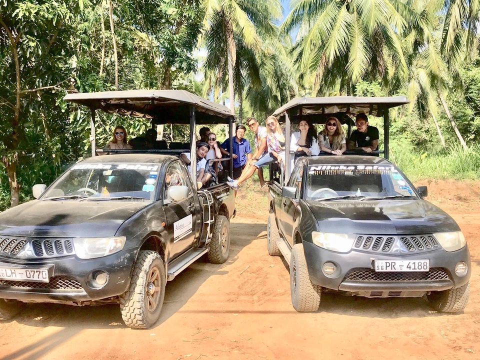 Woman walking into a tunnel with railway tracks.