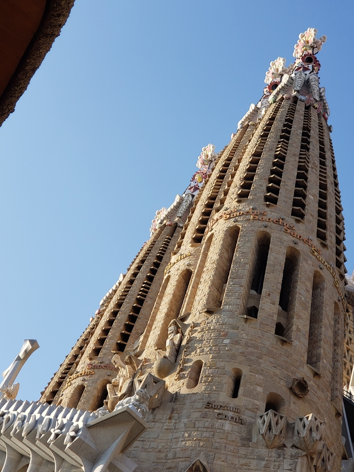 Partial view of the Sagrada Familia with intricate towers.