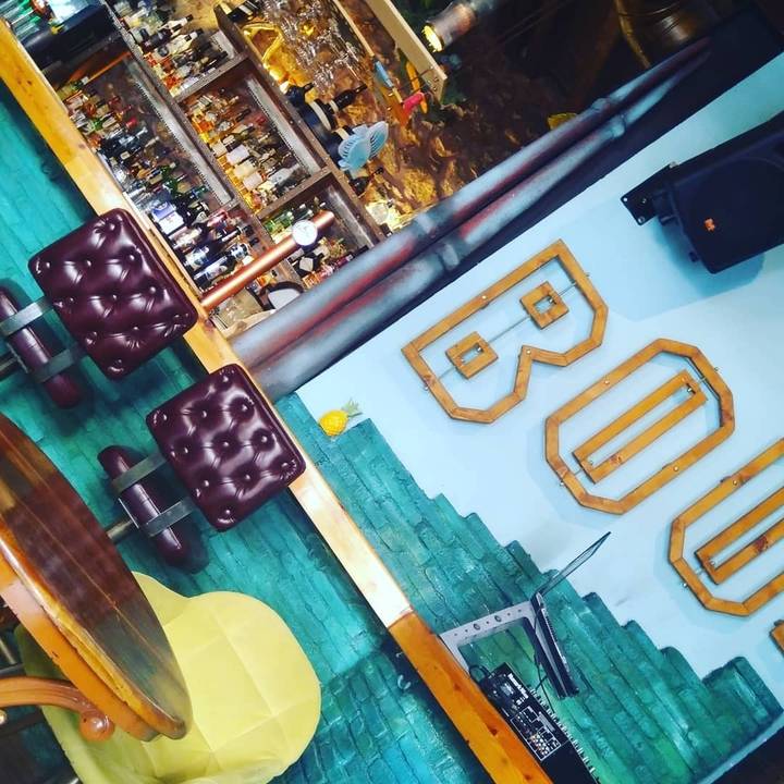 Interior of a bar with colorful decor.